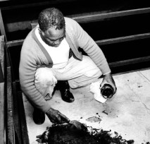 The owner tries to clean up the massive amount of blood.