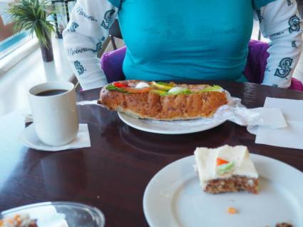 Icelandic meal: Kaffi, carrot cake, and a sandwich with a cup of shrimp, a hard-boiled egg, and ONE lettuce leaf