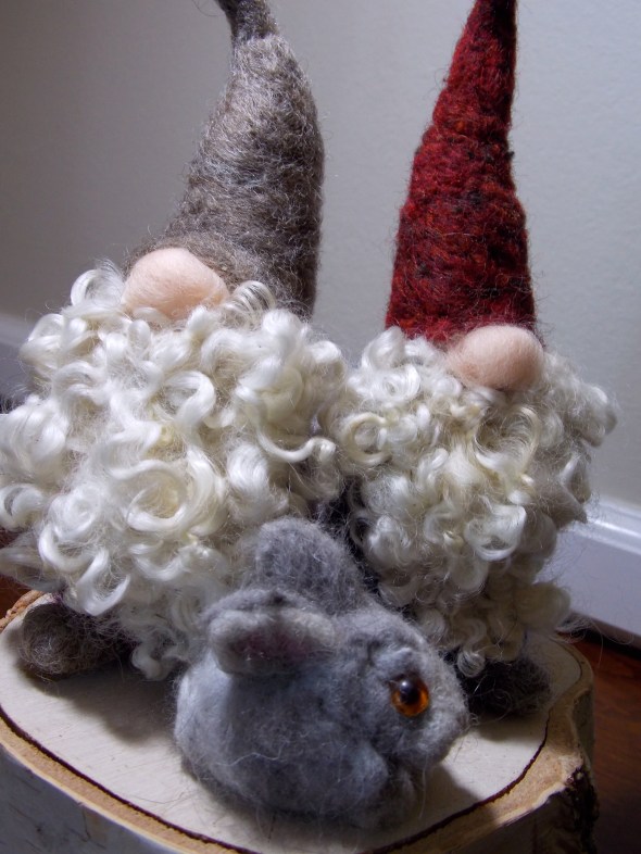 all local wool, and some angora rabbit wool also.  hand dyed and a $8 stump for them to gather on.